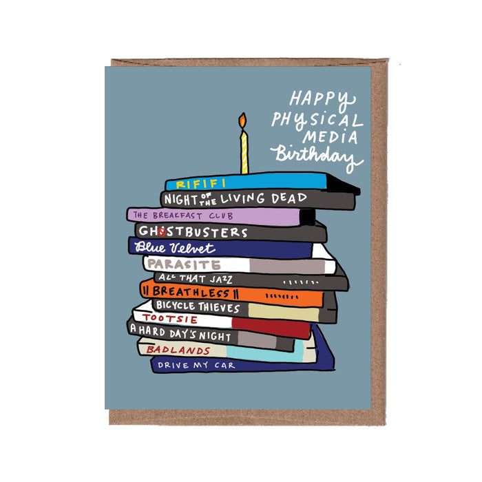 Card with stack of books and birthday candle on a blue background